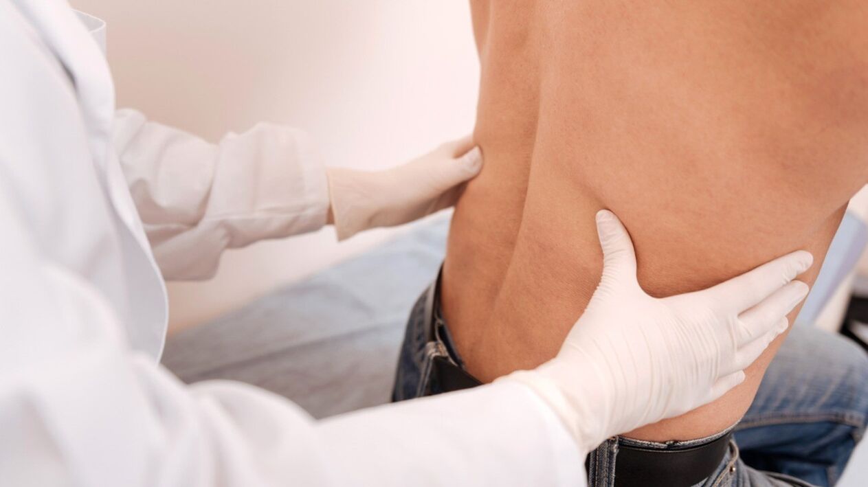 Initial examination of a patient with low back pain